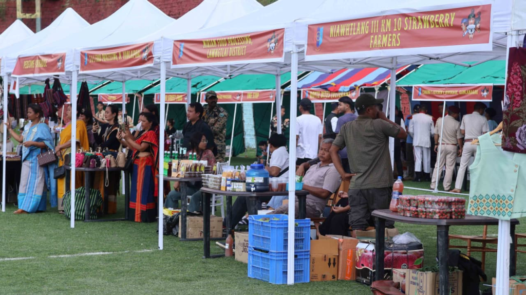 View of multiple exhibition and food stalls set up at the NCC Fest ground.