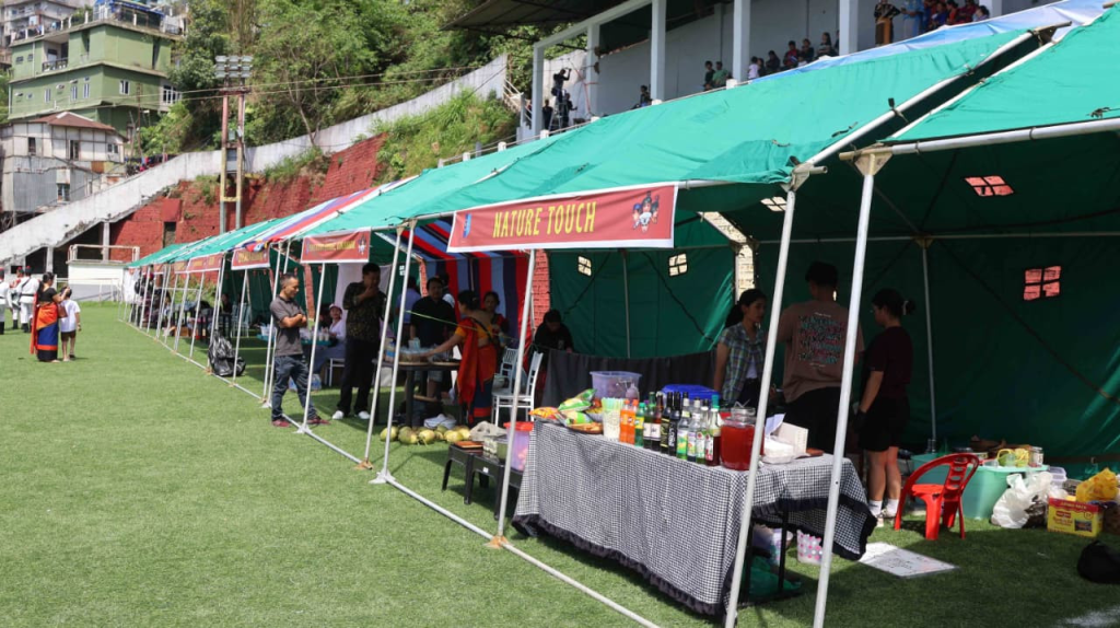 Nature Touch and organic product stalls at the NCC event.