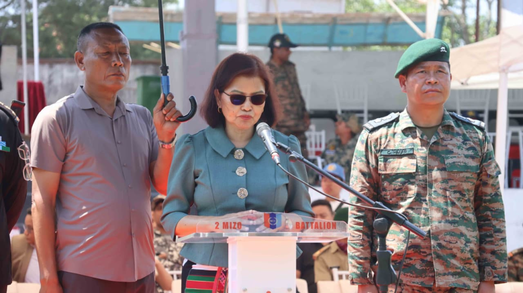 Health & Family Welfare Minister Pi Lalrinpuii speaking at the podium during the inauguration of Mizoram’s first NCC Fest & Parasailing Camp at C. Thuamluaia Mual, Lunglei.